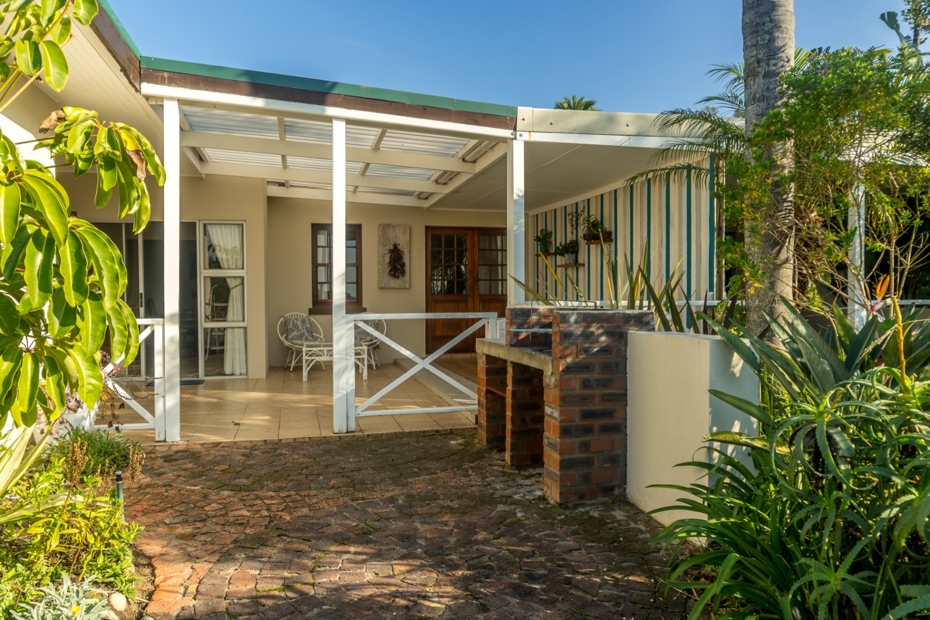 Covered patio entrance at Sunbird Chalet