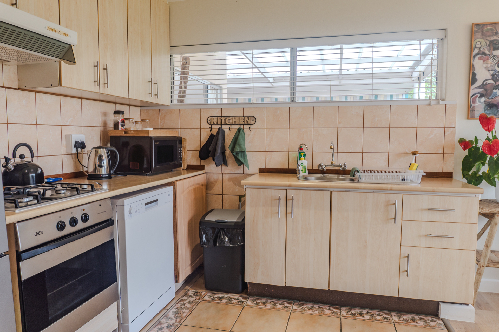 Fully equipped kitchen at Loerie Chalet